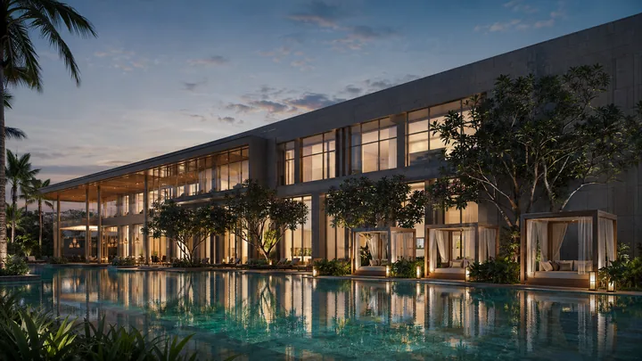 Godrej Soukya Road clubhouse exterior with reflective swimming pool at twilight Godrej Soukya Road clubhouse exterior with reflective swimming pool at twilight